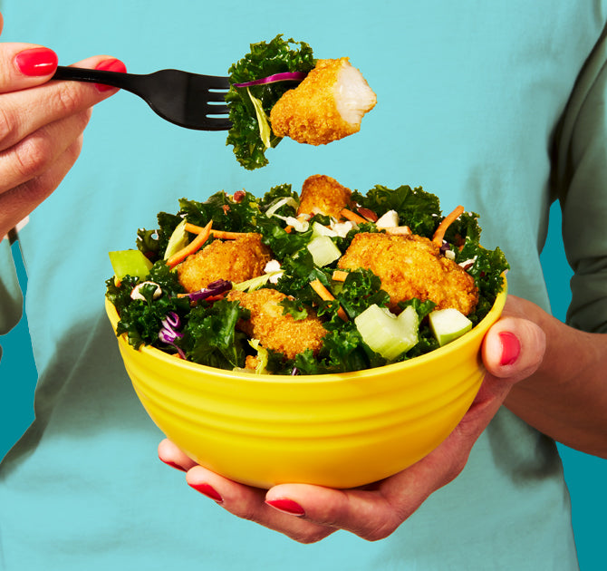 Kale Crunch Salad with Crispy Chicken Nuggets